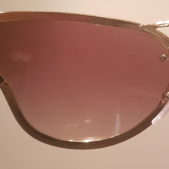 Prada Catwalk Sunglasses PR74VS (101) - Picture 15 of 16